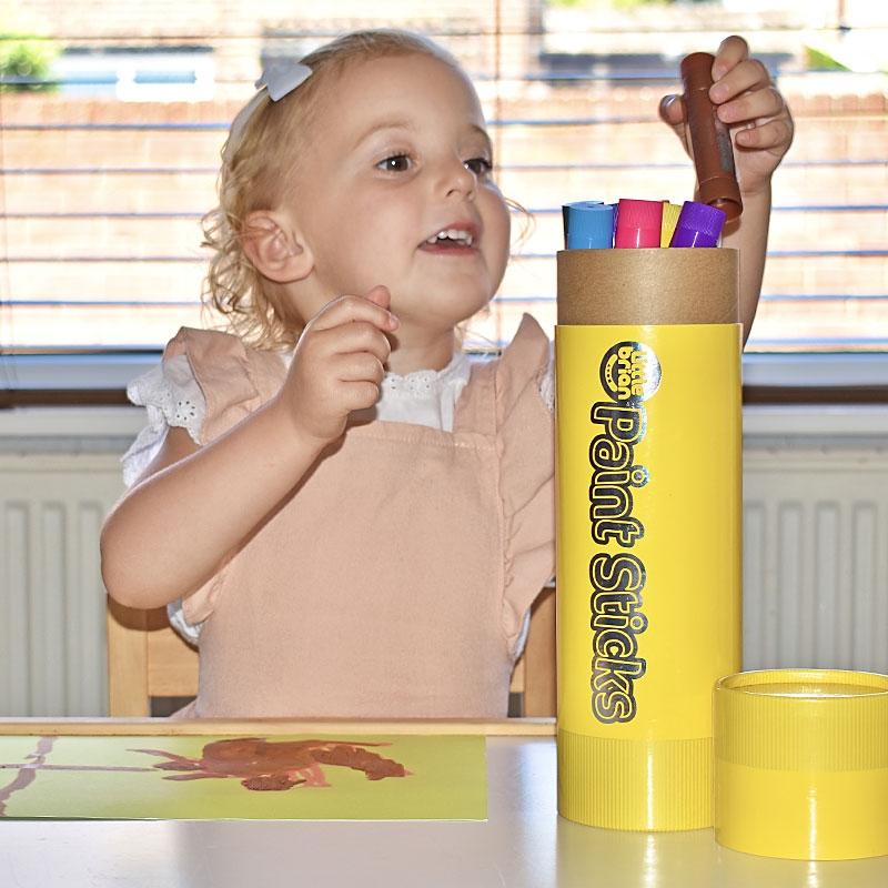 Young Girl Exploring Colours in Paint Sticks Giant Stick