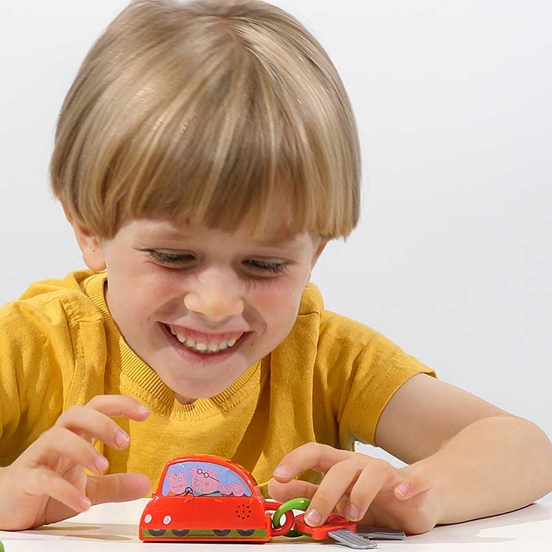 Peppa's Touch & Learn Key Fob - Young Boy Learning with Product