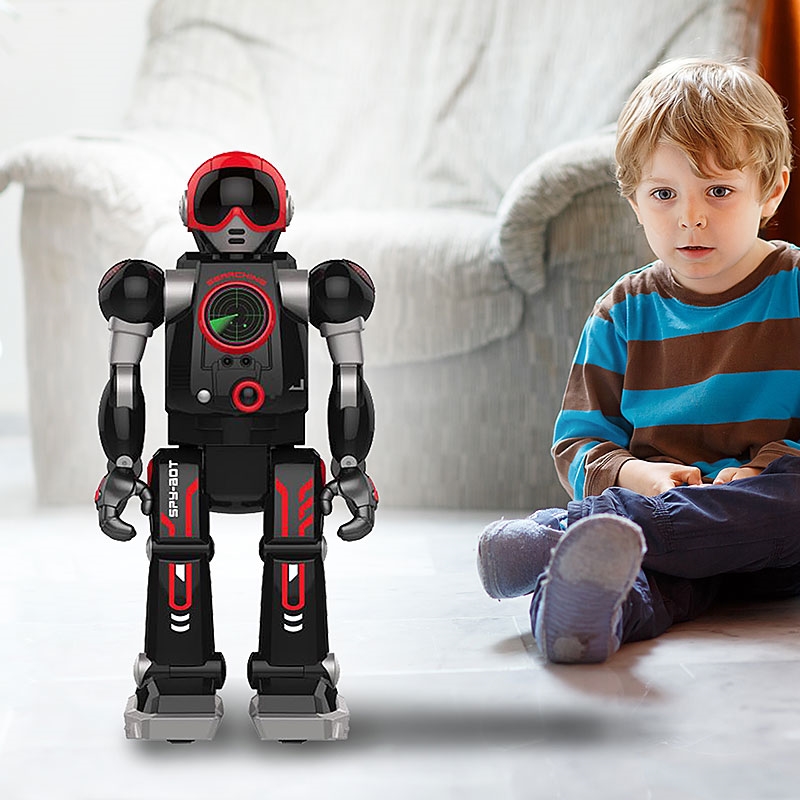 SpyX Spy Bot - Young Boy playing with Robot